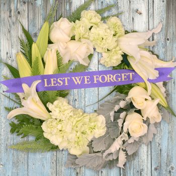White Wreath with Ribbon Flowers